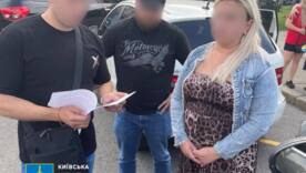 25 000 $ за "чистый" вход: Чиновница КГГА и директор рынка задержаны на взятке/Фото: Офис генпрокурора Киевские "решалы": как чиновники КГГА и рынка зарабатывали на аренде с препятствиями