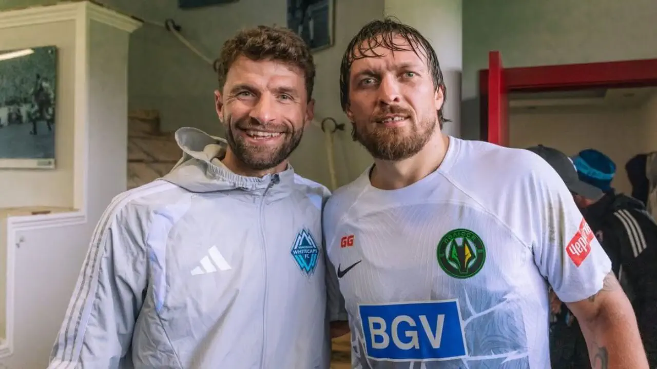 Томас Мюллер и Александр Усик