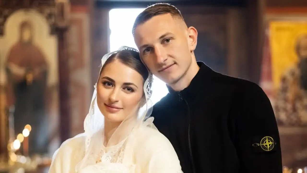Дмитро Різник з дружиною