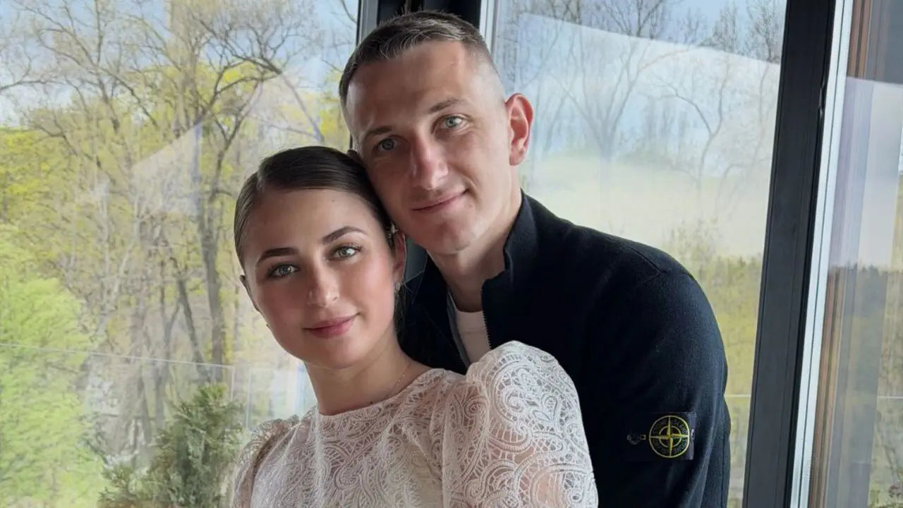 Дмитрий Ризнык с женой