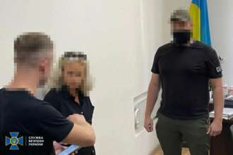СБУ затримала у Харкові чиновників міграційної служби/Фото: СБУ, Офіс генпрокурора СБУ затримала у Харкові чиновників міграційної служби/Фото: СБУ, Офіс генпрокурора