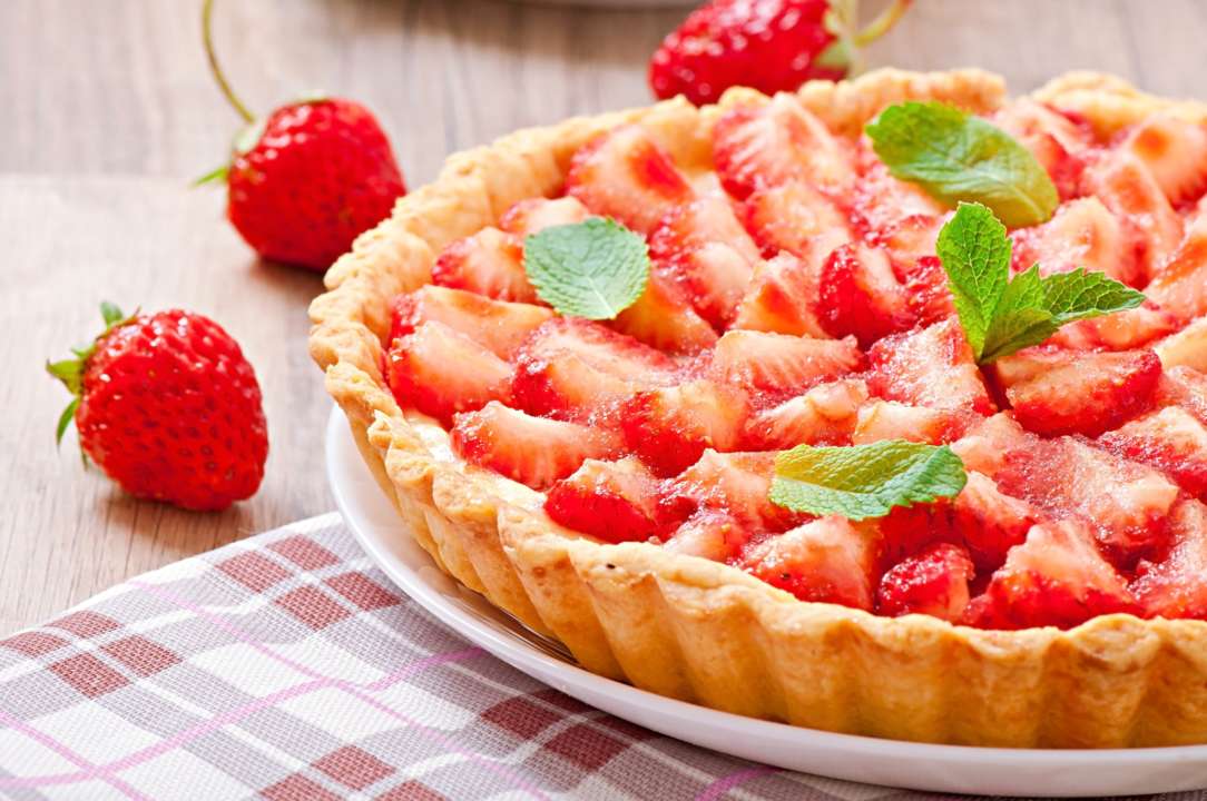 Божественно вкусный тарт с клубникой / Фото: Freepik Божественно вкусный тарт с клубникой / Фото: Freepik