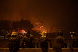 Пожежі в Греції Фото: Getty Images/Автор: Milos Bicanski Пожежі в Греції