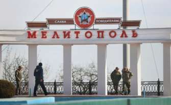 Фото: Сергей Мальгавко / ТАСС Российская пропаганда в действии: как дети Мелитополя прославляют Путина