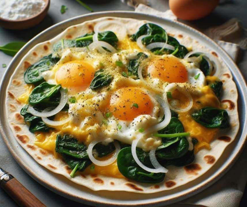 Яєчня на тортильї зі шпинатом та зеленню / Фото: Bing Яєчня на тортильї зі шпинатом та зеленню