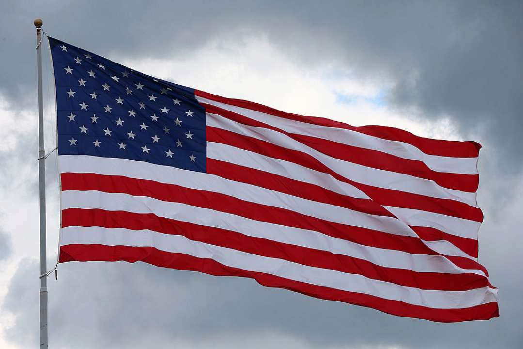 США выделили второй транш от крупного гранта /Фото: Tom Pennington/Getty Images Флаг США