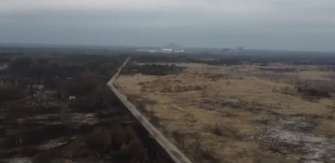 Оккупанты рыли окопы в "Рыжем лесу"/Фото: скриншот из видео Чернобыль