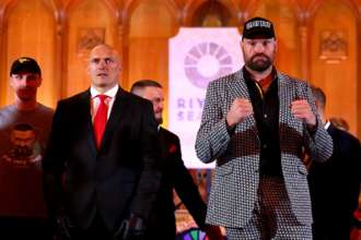 Getty Images/Global Images Ukraine. Олександр Усик та Тайсон Ф'юрі Усик та Ф'юрі