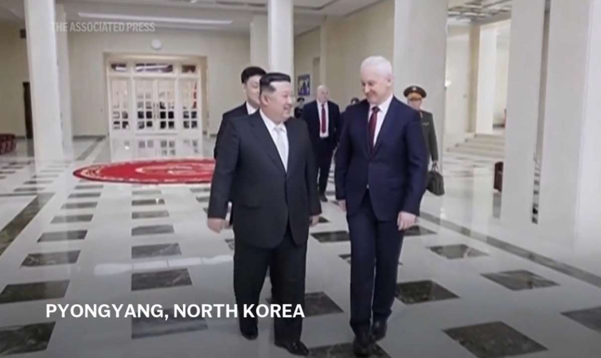 Кім Чен Ин та Андрій Бєлоусов