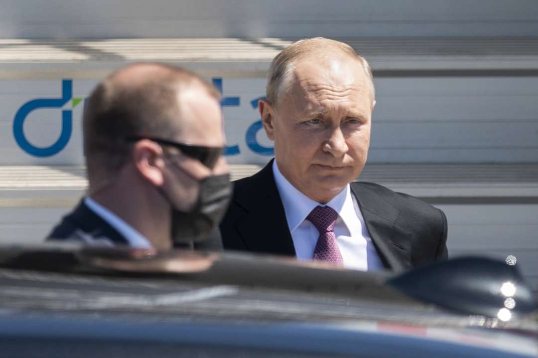 путін