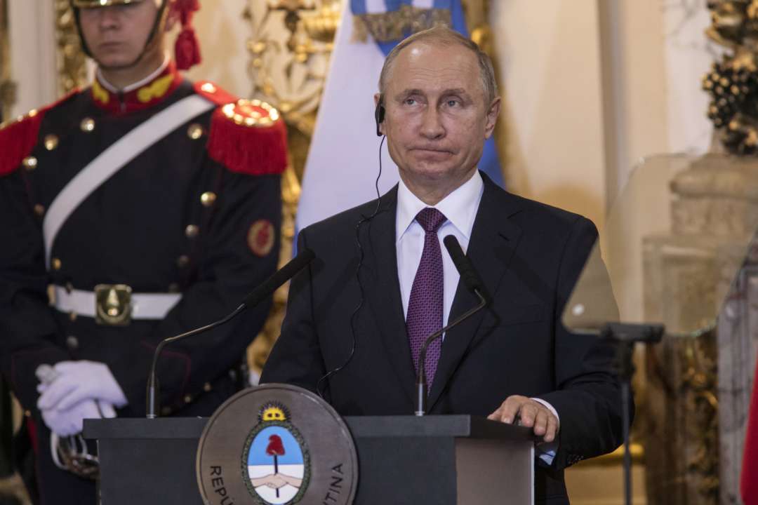 путін