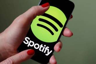 Spotify планирует запустить новый более дорогой план подписки/Фото: Getty Images Логотип Spotify