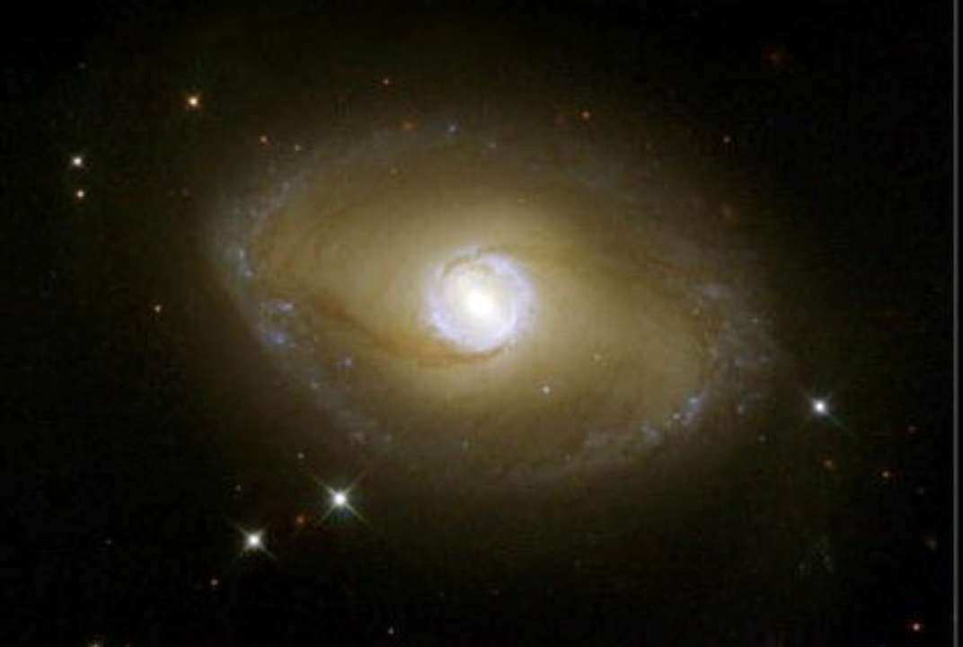 Hubble сфотографував незвичайну спіральну галактику/Фото: NASA/Getty Images Hubble сфотографував незвичайне злиття "багаторукавних" галактик